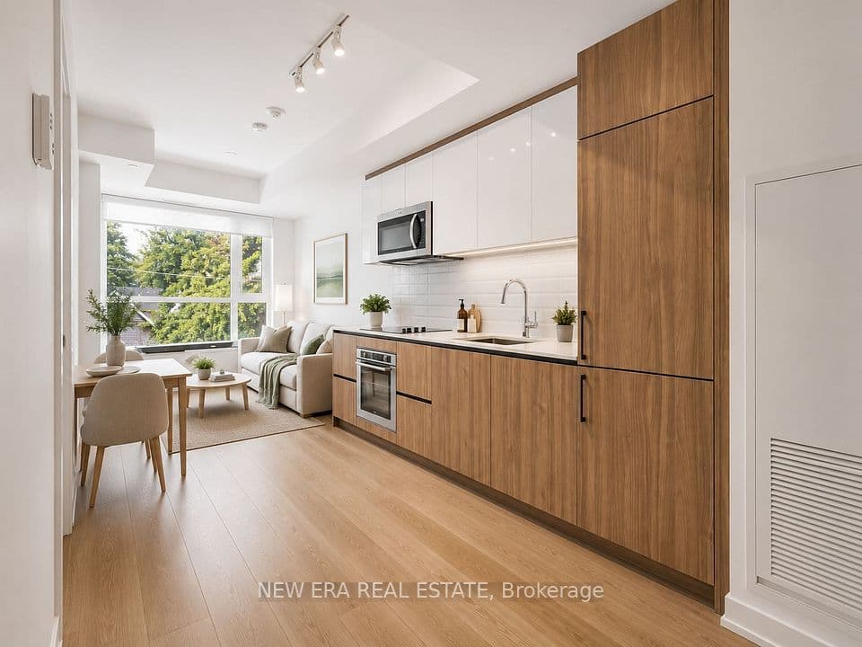 150 Logan Avenue 301, Toronto, ON M4M 0E4 – main photo